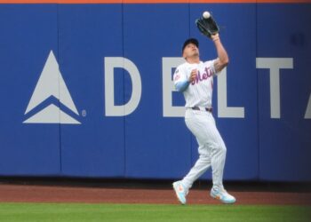 Tyrone Taylor, catching a ball during a game earlier in the season, began his rehab assignment with the Syracuse Mets on Sept. 20, 2025. and went 1-for-4.