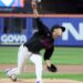 New York Mets pitcher Jonah Tong (21) throws a pitch in the first inning in his major league debut