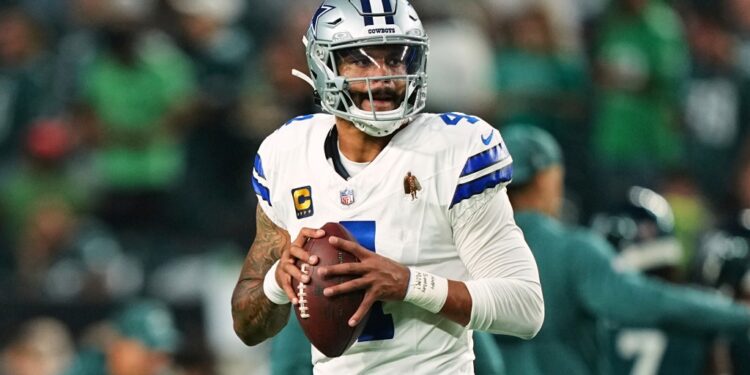 Dallas Cowboys quarterback Dak Prescott warms up before an NFL football game against the Philadelphia Eagles Thursday, Sept. 4, 2025, in Philadelphia.