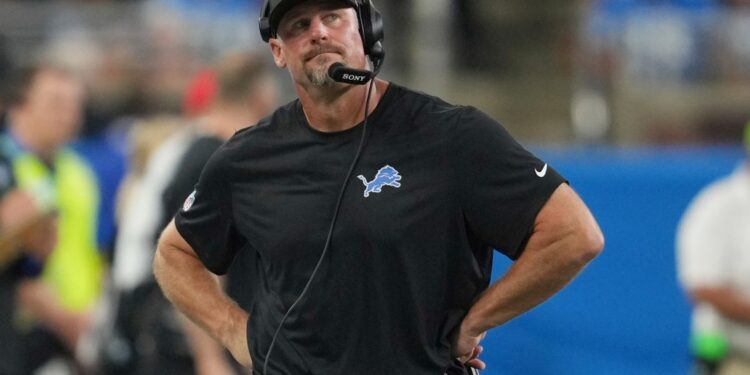 Lions coach Dan Campbell on the sidelines during a football game.