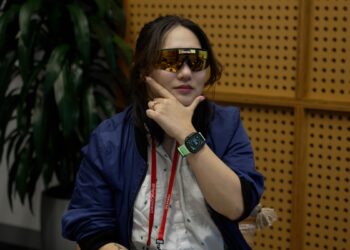 Photo of Senior Reviewer Victoria Song wearing the Oakley Meta Vanguard and looking like an absolute jabroni in the pose.