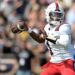Ball State Cardinals quarterback Kiael Kelly throwing a football.