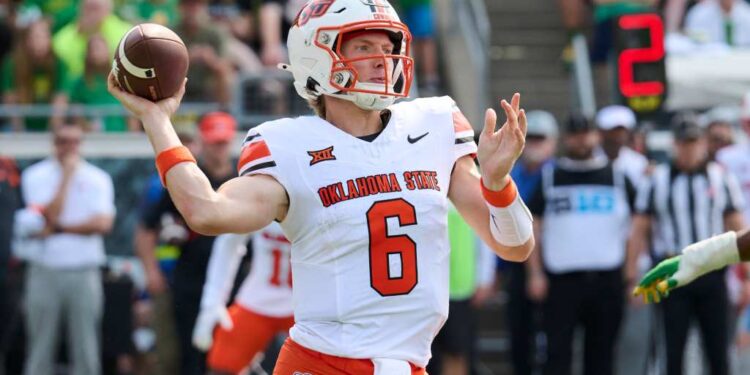 Oklahoma State quarterback Zane Flores throwing a football.