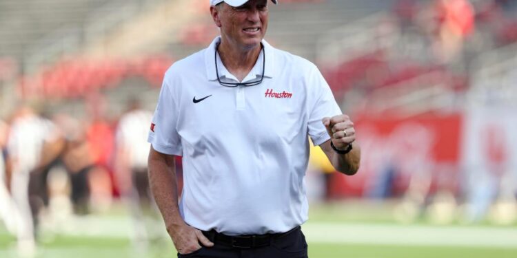Houston Cougars head coach Willie Fritz walks on the field.