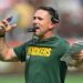 Green Bay Packers head coach Matt LaFleur shouting into his headset.