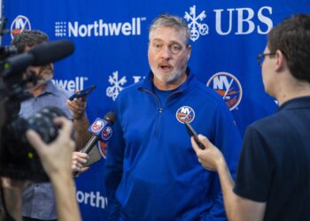 Patrick Roy talks with the media during an Islanders practice earlier this month.