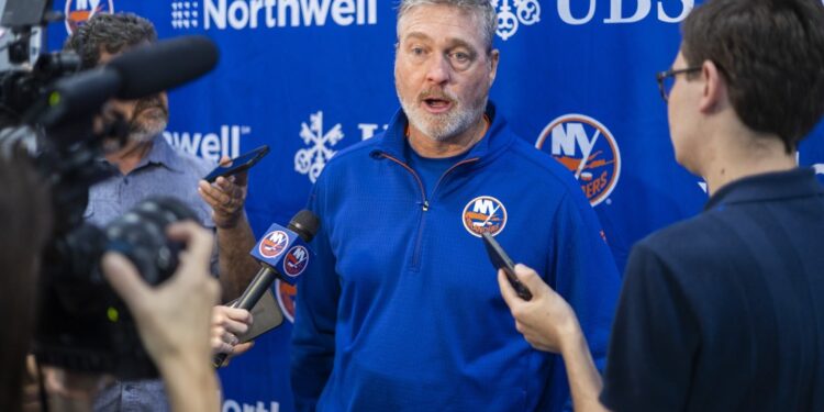 Patrick Roy talks with the media during an Islanders practice earlier this month.