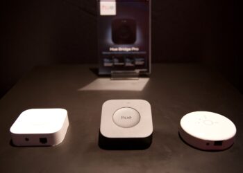 The new Hue Bridge Pro (center) is the third generation of the company’s Zigbee hub.