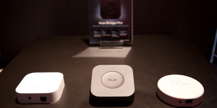 The new Hue Bridge Pro (center) is the third generation of the company’s Zigbee hub.