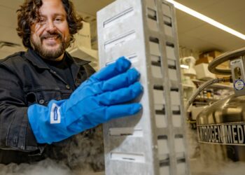 Ben Lamb holding a rack of samples in liquid nitrogen.