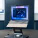 This stand can automatically lift, tilt, and turn your laptop toward you