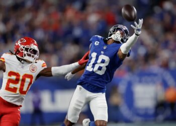 Kansas City Chiefs and New York Giants football players.