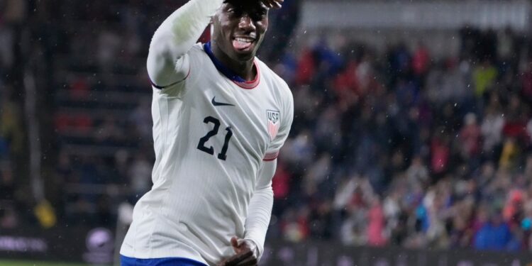 United States' Tim Weah celebrates after scoring during the second half in a CONCACAF Nations League quarterfinal second leg soccer match against Jamaica Monday, Nov. 18, 2024, in St. Louis.