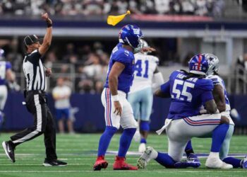 James Hudson (No. 55) is flagged during the Giants-Cowboys game on Sept. 14, 2025.