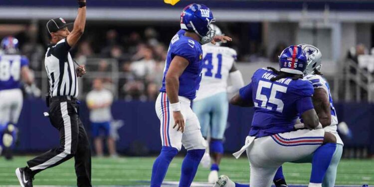 James Hudson (No. 55) is flagged during the Giants-Cowboys game on Sept. 14, 2025.