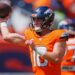 Denver Broncos quarterback throwing a football.