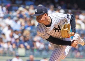 New York Yankees pitcher throwing a pitch.