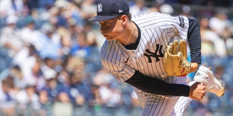 New York Yankees pitcher throwing a pitch.