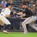 Anthony Volpe, who has played better recently since receiving a cortisone shot on his left shoulder, gets thrown out in a rundown after  trying to steal home in  the sixth inning of the Yankees' 8-4 win over the Orioles on Sept. 26, 2025.