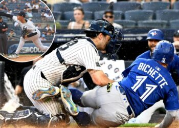 Yankees finally figure out how to beat Blue Jays after lengthy rain delay