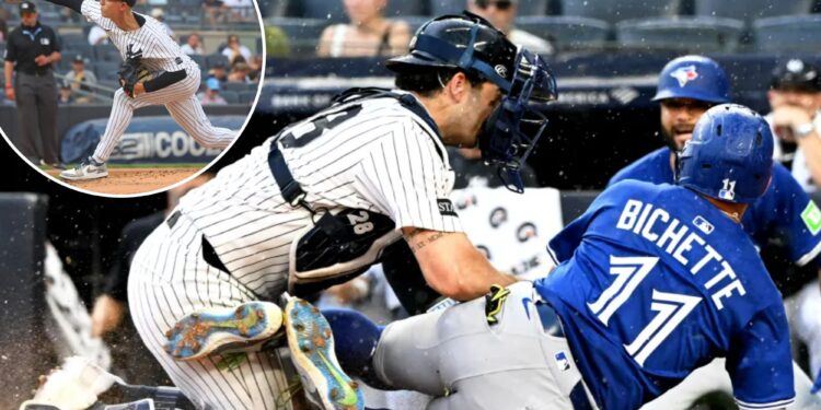 Yankees finally figure out how to beat Blue Jays after lengthy rain delay