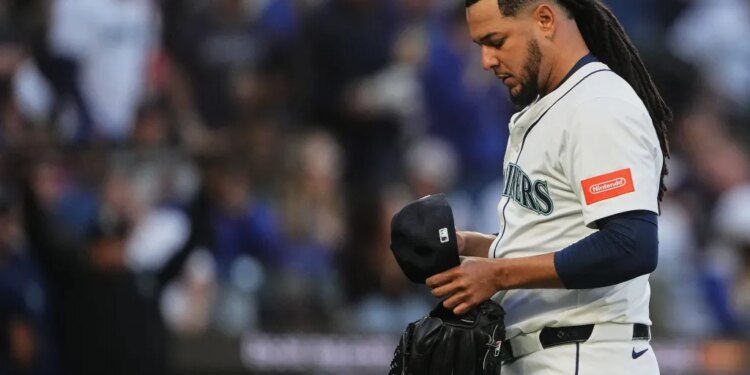 Seattle Mariners starting pitcher Luis Castillo walks back to the dugout after the top of the fourth inning in Game 2 of baseball's American League Division Series against the Detroit Tigers, Sunday, Oct. 5, 2025, in Seattle.