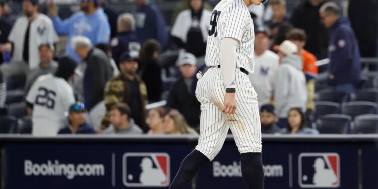 New York Yankees right fielder Aaron Judge looks at the celebrating Toronto Blue Jays after their win of Game four of the ALDS.