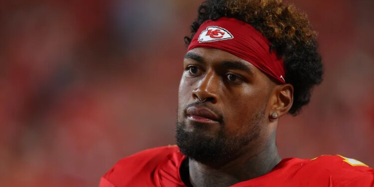 Kansas City Chiefs player with a red headband.
