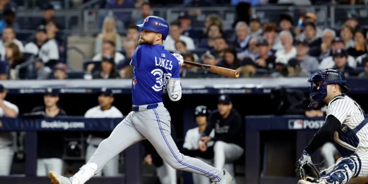 Toronto Blue Jays right fielder Nathan Lukes hitting a two-run single during the 7th inning.
