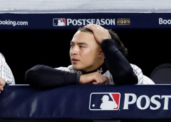 New York Yankees shortstop Anthony Volpe look dejectedly in the dugout during the final out against the Toronto Blue Jays as they win of Game four of the ALDS in the Bronx, New York, October 08, 2025.
