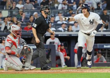 Anthony Volpe points to the Yankees' dugout after hitting a solo home run in the second inning of the Yankees' 3-1 loss to the Red Sox in Game 1 of their AL wild-card series on Sept. 30, 2025.