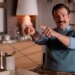 Jason Sudeikis as Ted Lasso pointing and smiling.