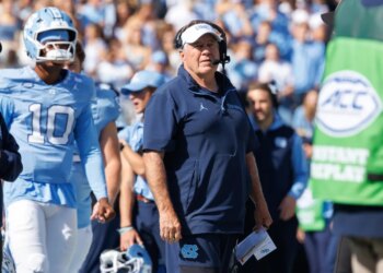 North Carolina head coach Bill Belichick watches his football team during a game.