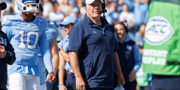 North Carolina head coach Bill Belichick watches his football team during a game.