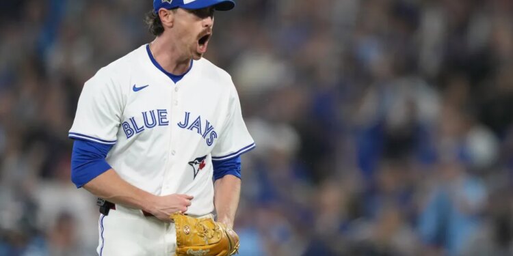 Toronto Blue Jays pitcher Shane Bieber reacts after getting an out.