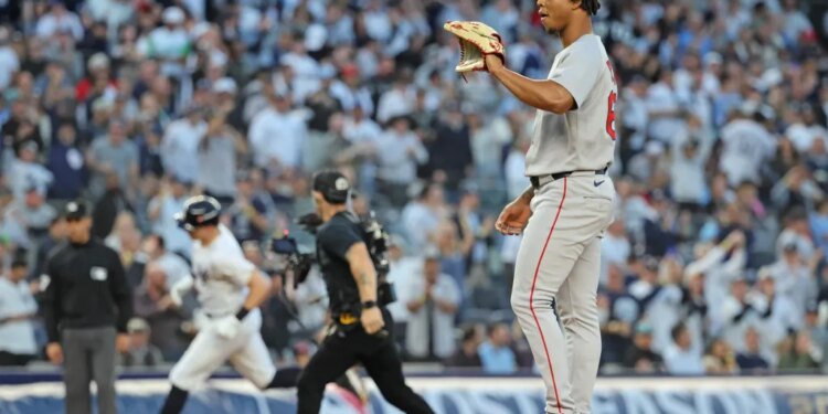 Brayan Bello on the mound as Ben Rice rounds the bases.
