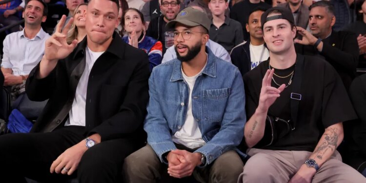 Cam Schlittler (right) with Devin Williams (middle) and Aaron Judge at Knicks game on Oct. 22, 2025.