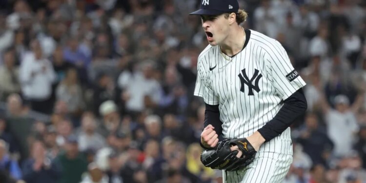 Cam Schlittler #31 of the New York Yankees reacts after striking out Jarren Duran #16 of the Boston Red Sox.