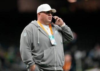 Philadelphia Eagles chief security officer Dom DiSandro speaking on a phone at Super Bowl 59.