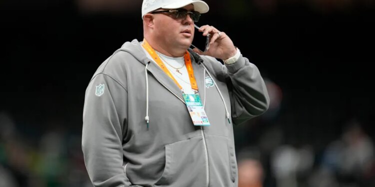 Philadelphia Eagles chief security officer Dom DiSandro speaking on a phone at Super Bowl 59.