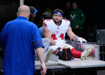Giants running back Cam Skattebo (44) leaves the field after an injury during the first half of an NFL football game against the Philadelphia Eagles on Sunday, Oct. 26, 2025, in Philadelphia.