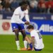 United States forward Tim Weah, left, helps up forward Christian Pulisic after he was injured against Australia in the first half of an international friendly soccer match Tuesday, Oct. 14, 2025, in Commerce City, Colo.