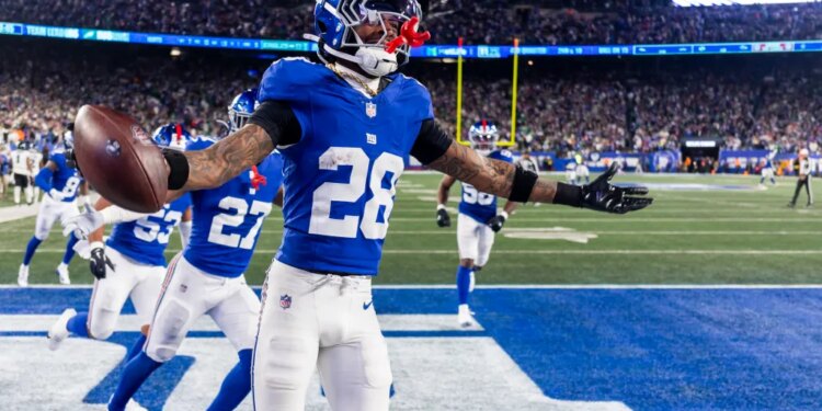 New York Giants cornerback Cordale Flott (28) celebrates his intereption in the second half against the Philadelphia Eagles at MetLife Stadium Thursday, Oct. 9, 2025, in East Rutherford, NJ.