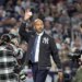 New York Yankees great Derek Jeter waves to the crowd as he walks out to throw the first pitch of the game before the start of tonightâs game.