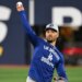 Los Angeles Dodgers shortstop Mookie Betts (50) throws the ball during World Series team workouts at Rogers Centre.