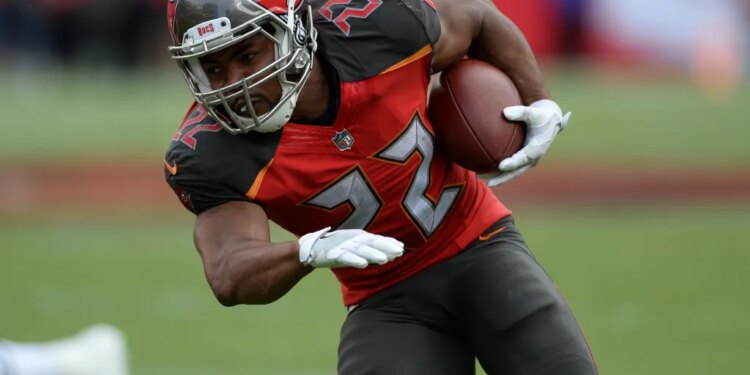 Doug Martin running with the football.