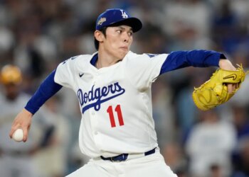 Los Angeles Dodgers pitcher Roki Sasaki throws a pitch during a game.