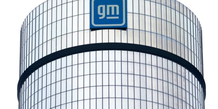 The General Motors logo is seen on its headquarters building in Detroit.