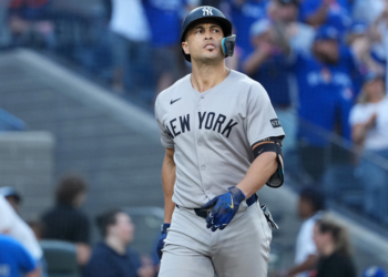 New York Yankees designated hitter Giancarlo Stanton reacts after striking out.