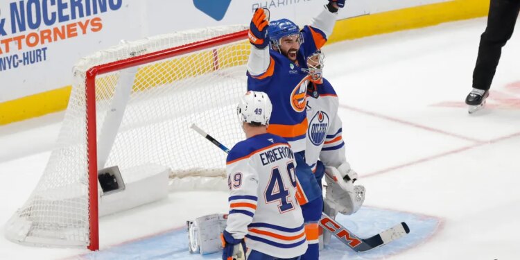 Islanders reacts after Bo Horvat #14 of the New York Islanders scores a goal during the third period when the New York Islanders played the Edmonton Oilers Thursday, October 16, 2025 at UBS Arena in Elmont, NY.